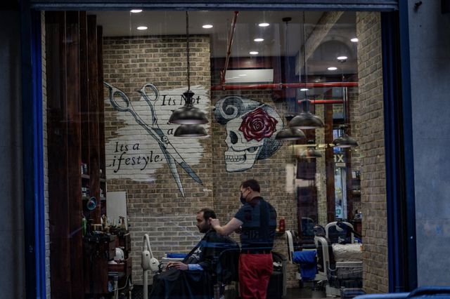 a guy getting a haircut